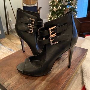 Black Aldo ankle strap heels